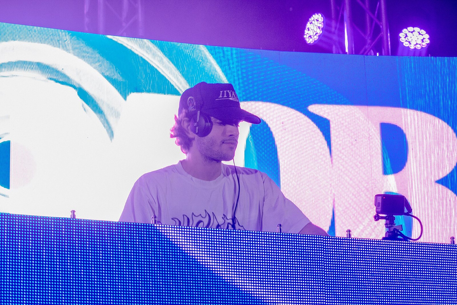 Odd Mob DJing on stage in front of an LED wall, February 2026