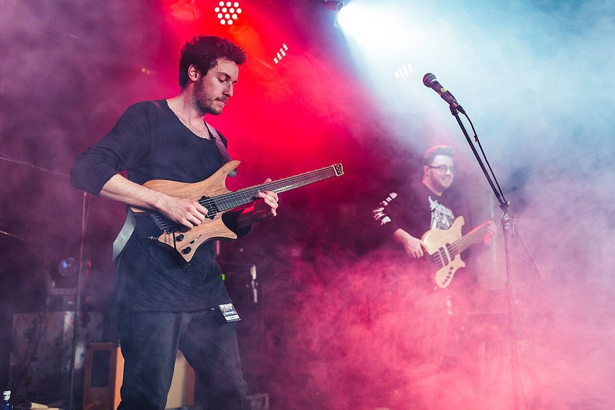 Plini on stage with bassist Simon Grove during his 2017 European tour