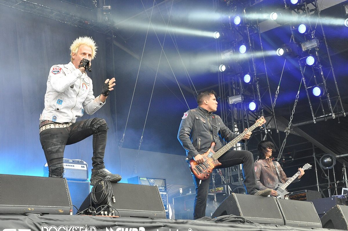Buy Powerman 5000 tickets on StubOrder Powerman 5000 singer Spider One with the bassist and a guitarist on stage at Rock am Ring 2014