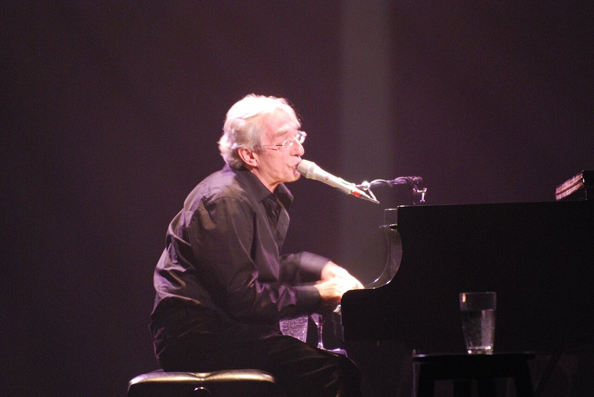 Buy Richard Desjardins tickets on StubOrder Richard Desjardins singing at the piano in concert at Arvida, Saguenay, 2012