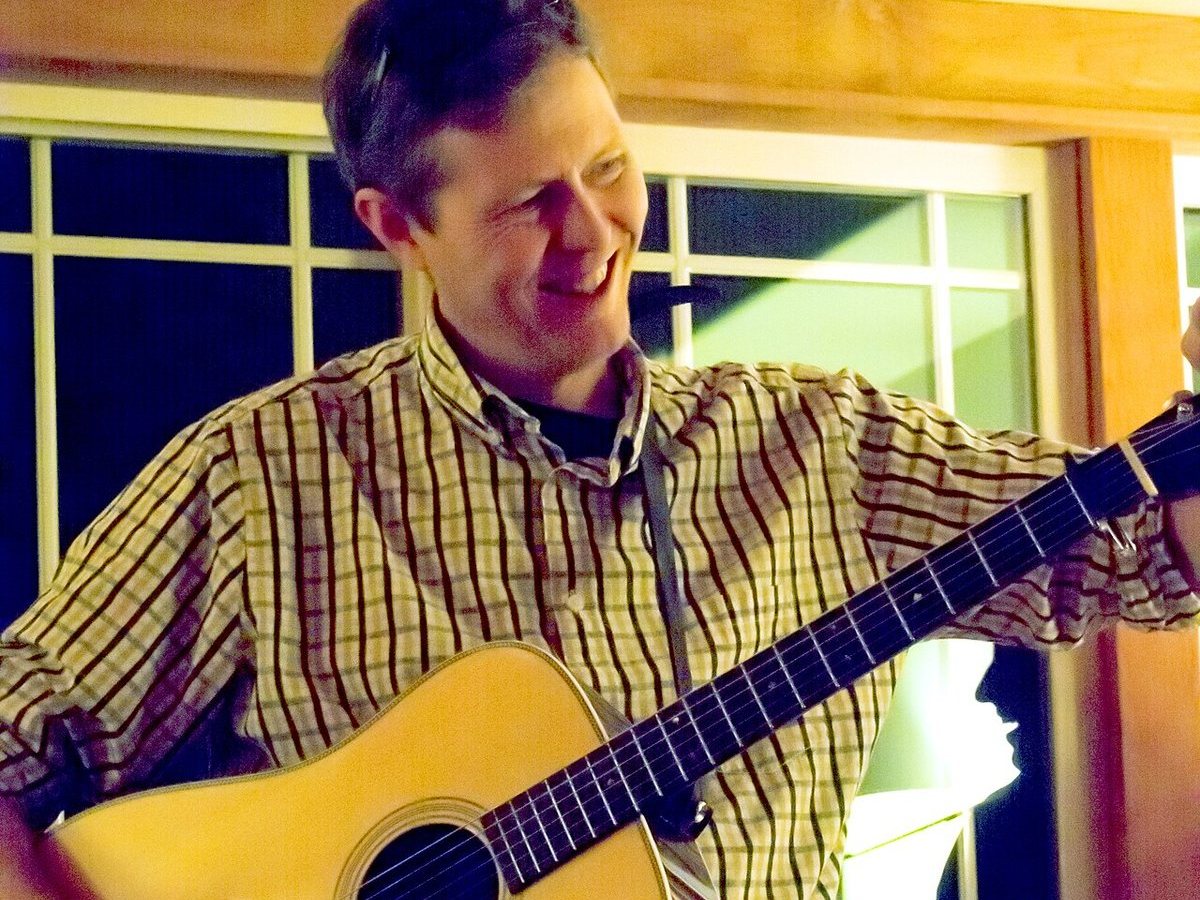 Buy Robbie Fulks & Heather Maloney tickets on StubOrder Robbie Fulks playing acoustic guitar at a house concert, December 2013