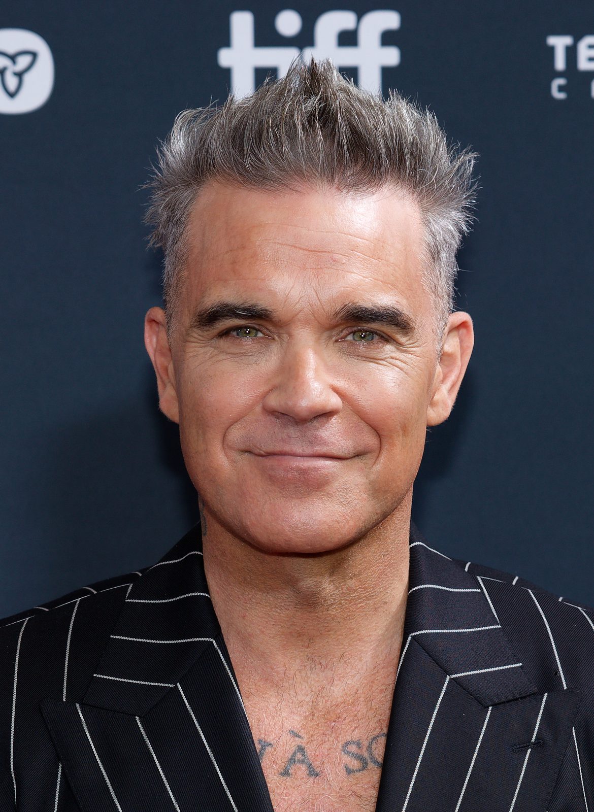 Robbie Williams performing live - Robbie Williams tickets