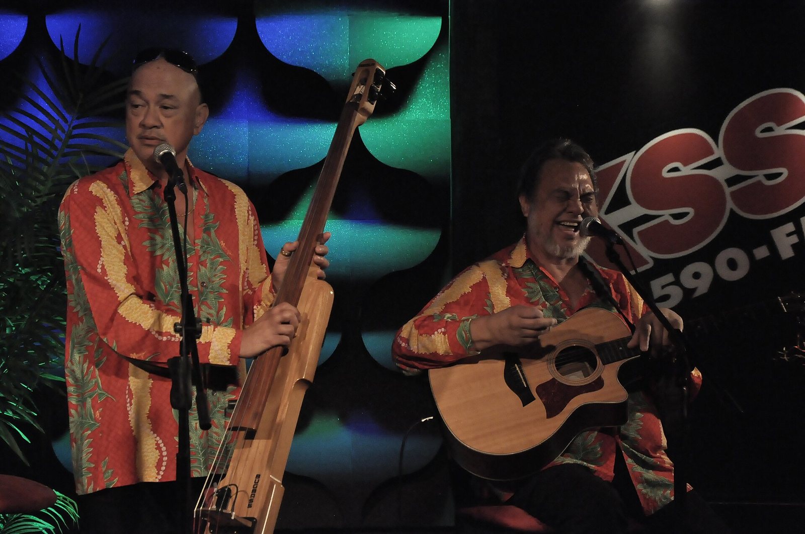 Robert Cazimero (left, on bass) performing with Roland Cazimero at thehall.tv studio, 2009