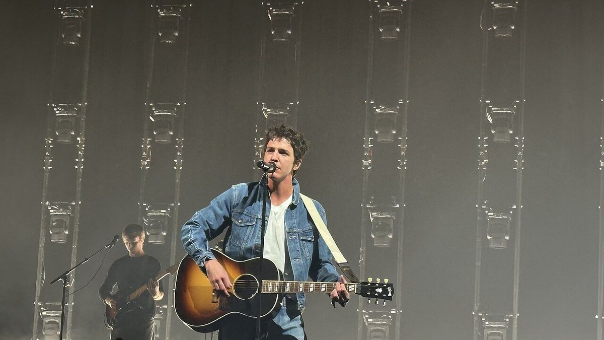 Role Model performing with an acoustic guitar at The Armory, Minneapolis, September 2026