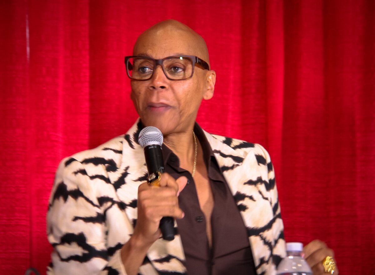 RuPaul speaking into a microphone at RuPaul's DragCon LA, 2019