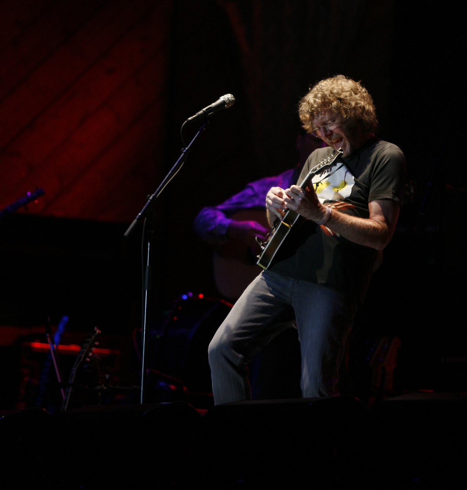Sam Bush playing mandolin on stage at the Telluride Bluegrass Festival, Colorado, June 2012