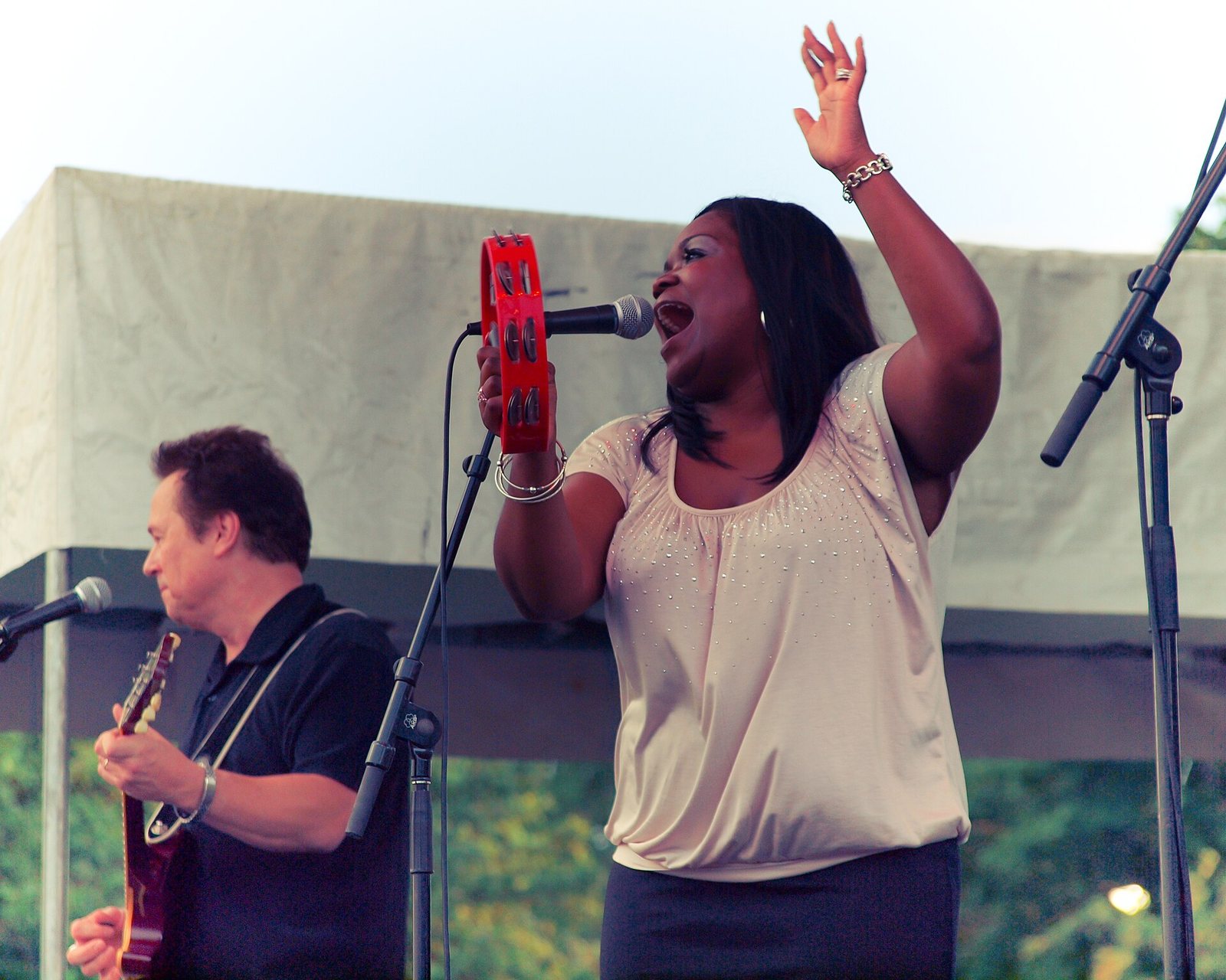 Shemekia Copeland singing with a tambourine at the Chicago Folk and Roots Festival, Chicago, 2010