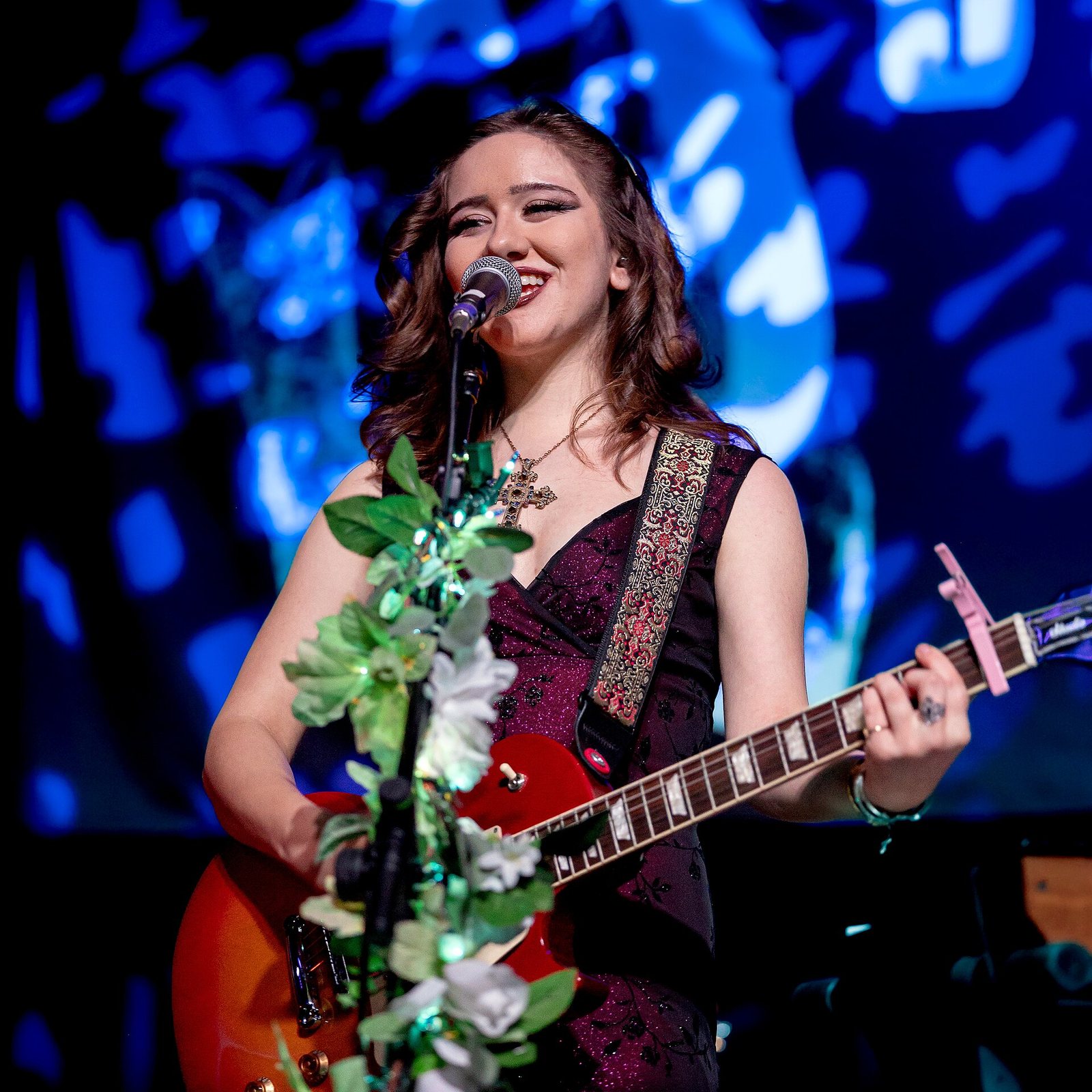 Solya singing and playing guitar at the Pacific Electric, Los Angeles, September 2026