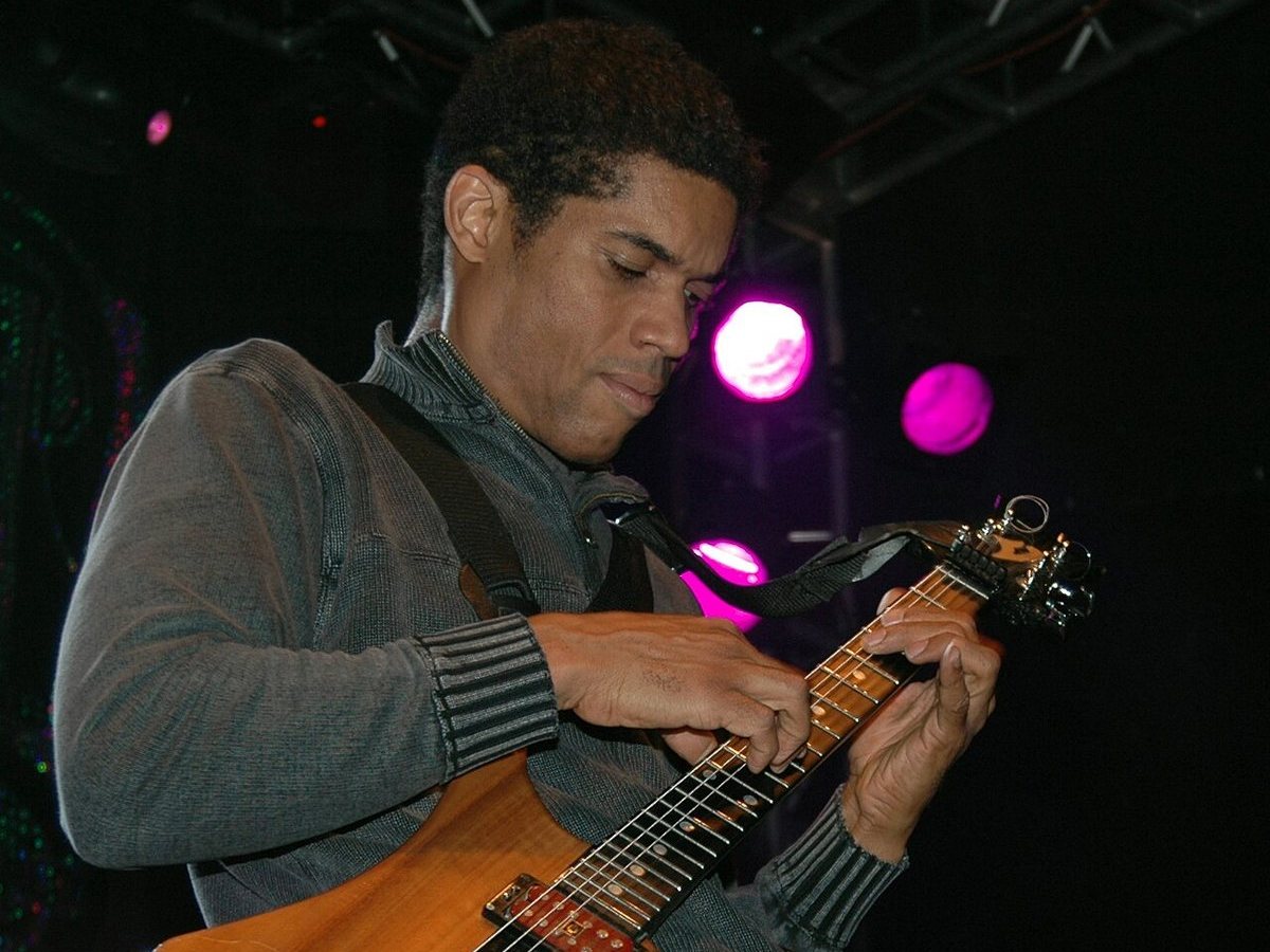 Stanley Jordan playing guitar with his touch tapping technique on stage, 2006