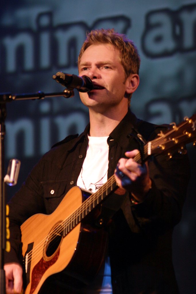 Steven Curtis Chapman singing and playing acoustic guitar in concert, 2004