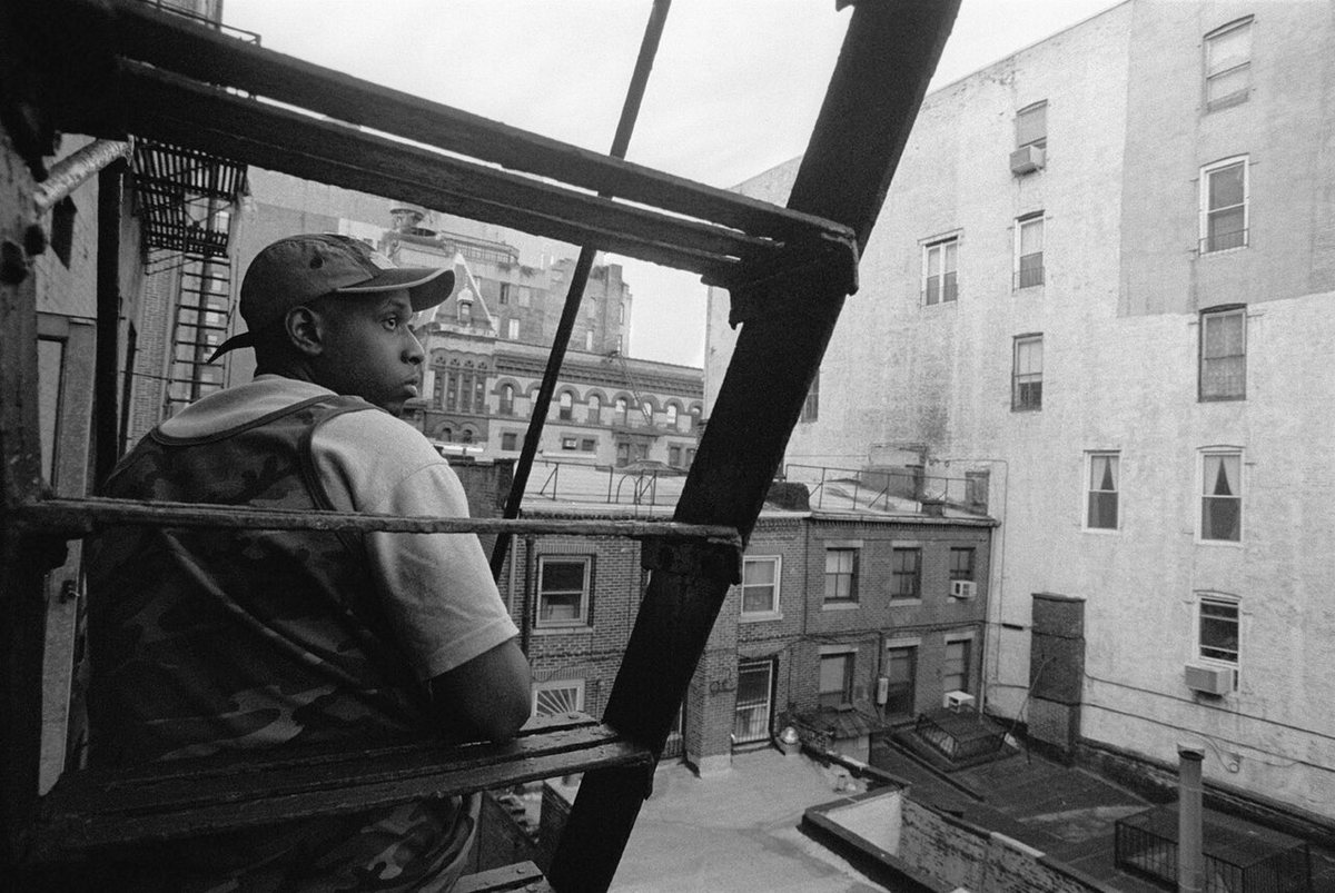 Buy Talib Kweli & Graphic Melee tickets on StubOrder Talib Kweli on the fire escape at Rawkus Records in New York City, 1999