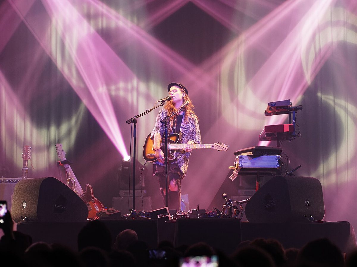 Tash Sultana performing on stage with guitar in the Netherlands, June 2017