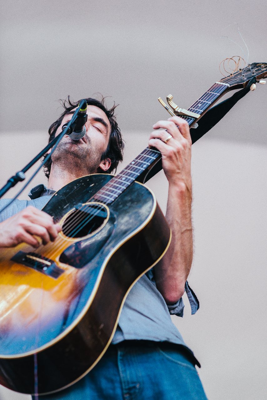 The Barr Brothers singer and guitarist performing at Edmonton Folk Fest, 2015