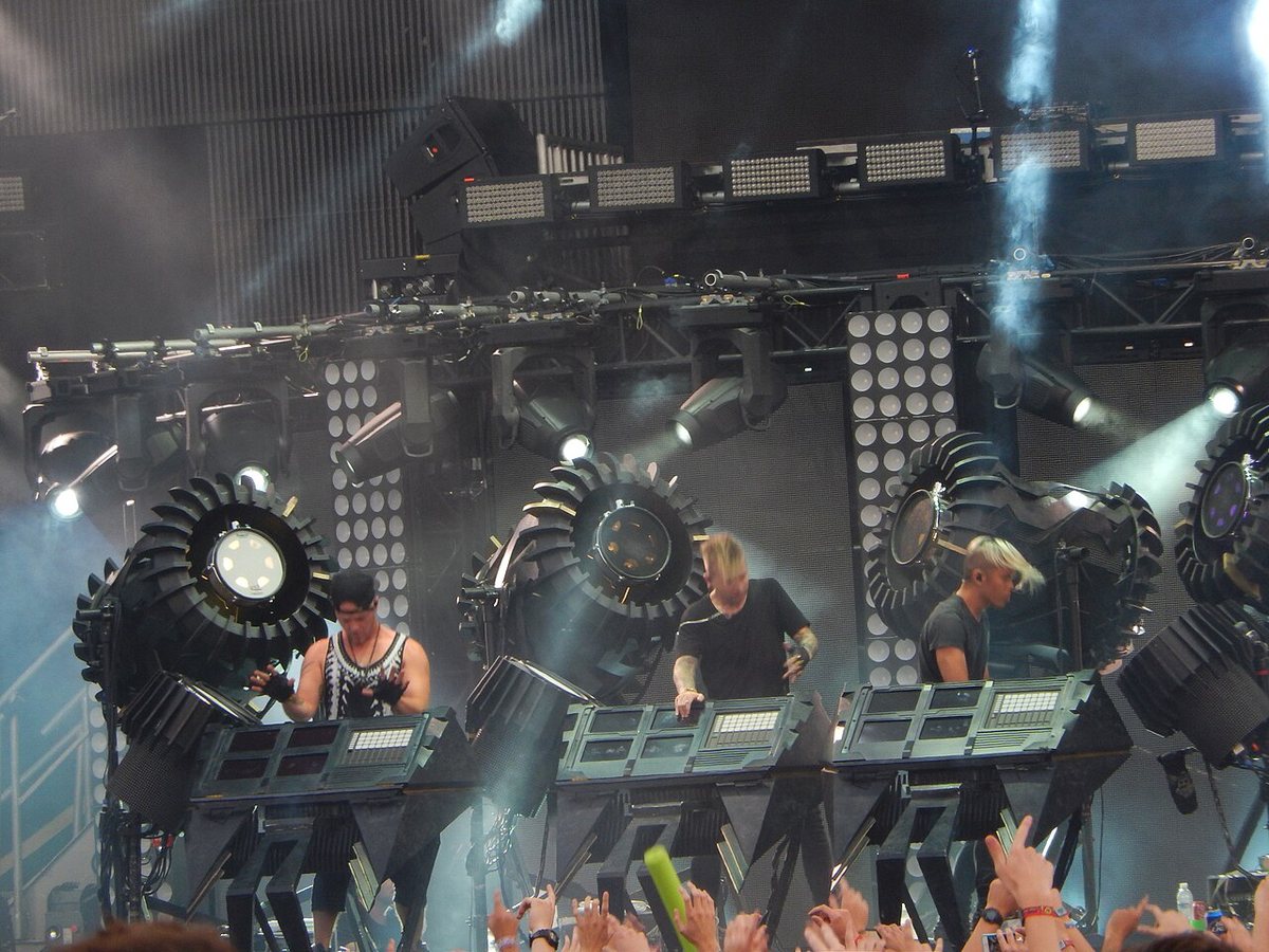 The Glitch Mob performing behind their stage rig at Lollapalooza, Chicago, 2014