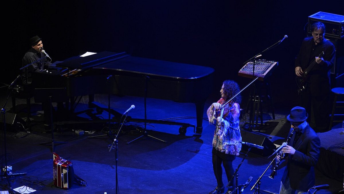 The Klezmatics on stage with piano, violin, clarinet and bass guitar, January 2015