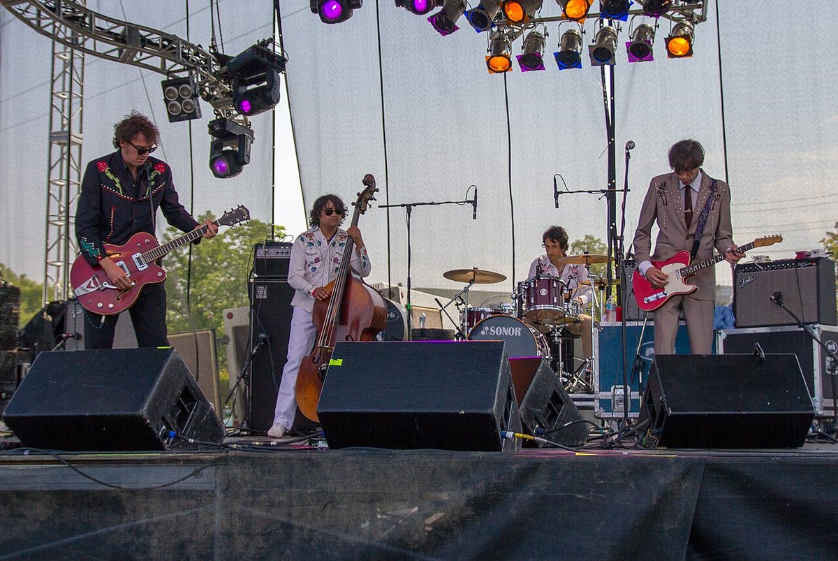 The Sadies on stage with guitars, upright bass and drums at the Sound of Music Festival, Burlington, Ontario, 2011
