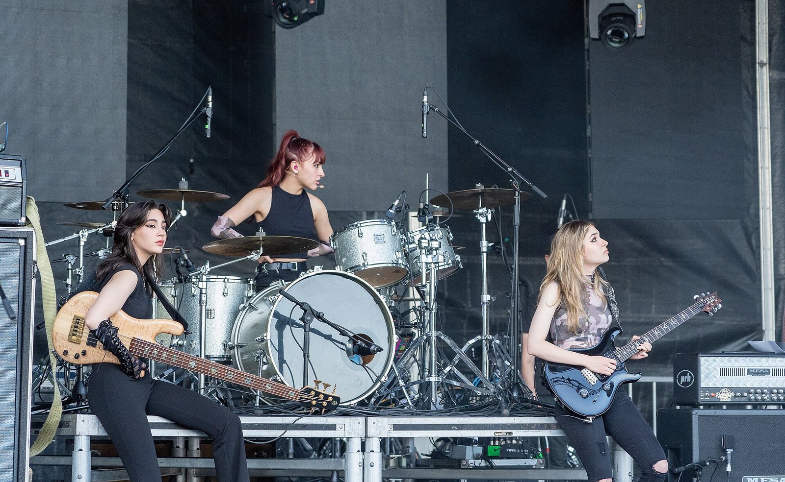 The Warning on stage with their instruments at the Sound of Music Festival, Burlington, Ontario, 2022
