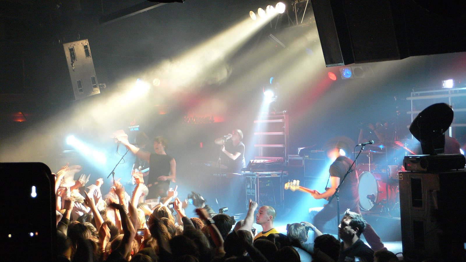 Thursday performing live under stage lights in front of a packed crowd, December 2006
