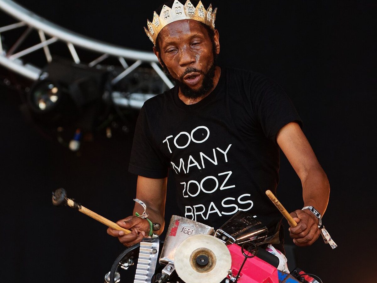 Buy Too Many Zooz tickets on StubOrder Too Many Zooz percussionist playing his bass drum rig on stage at Festival des Vieilles Charrues, 2016