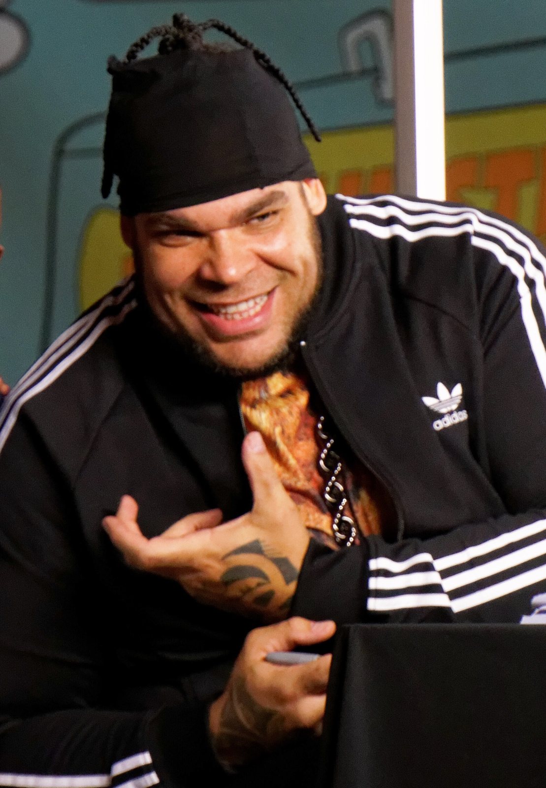 Tyrus (George Murdoch) smiling at a fan signing in New Orleans, 2014