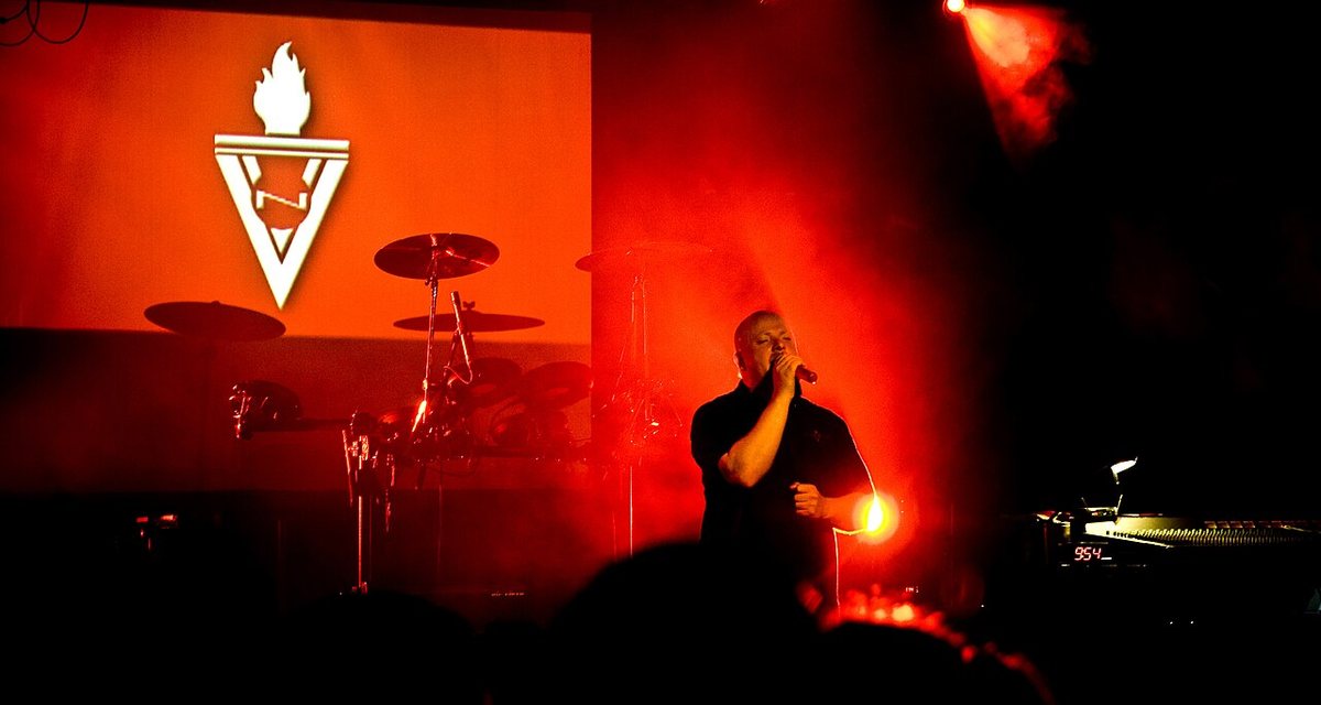 Ronan Harris of VNV Nation performing in front of the band's torch logo at the Hi-Fi Bar, Melbourne, 2008