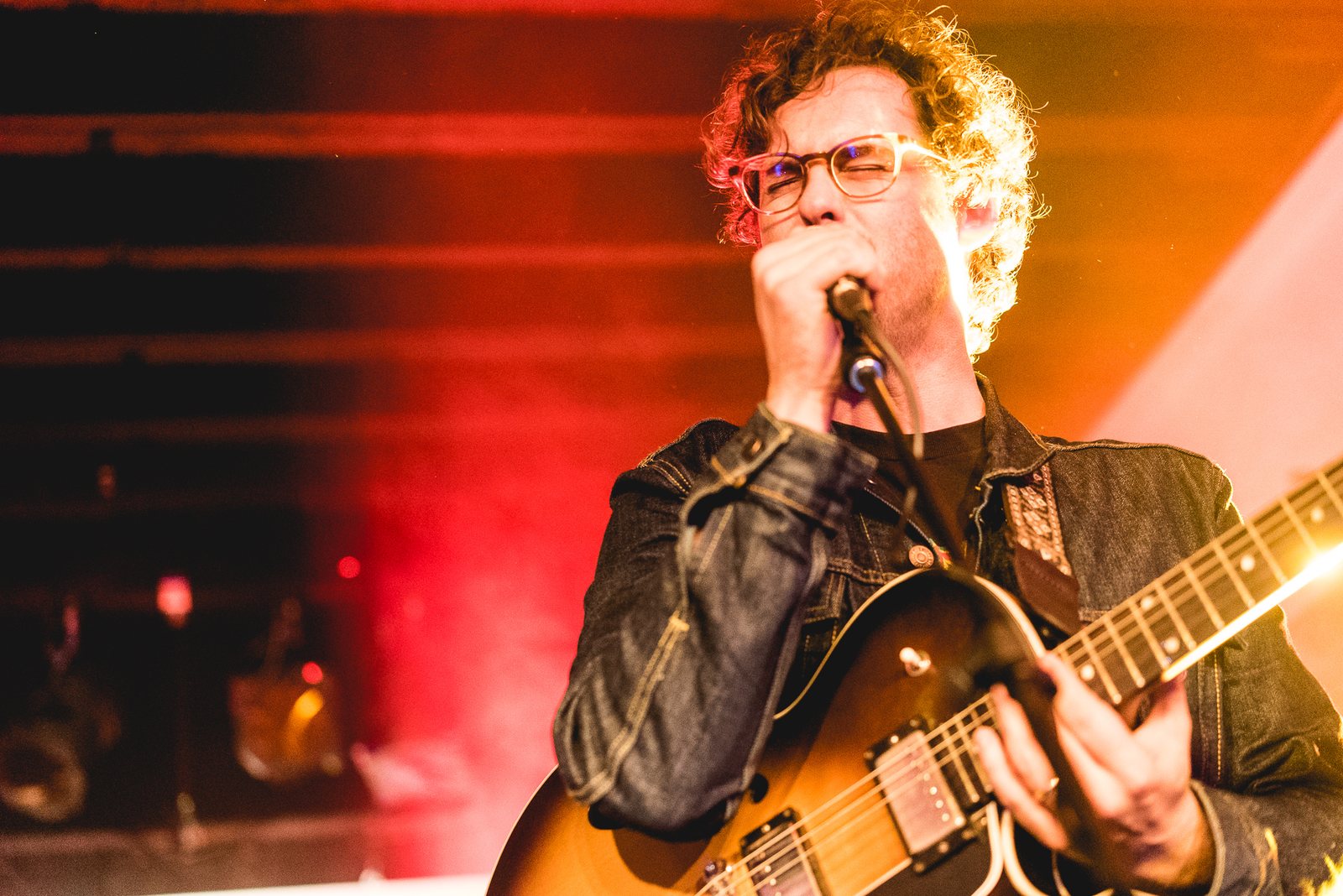 White Denim's frontman singing and playing guitar at SXSW 2016 in Austin, Texas