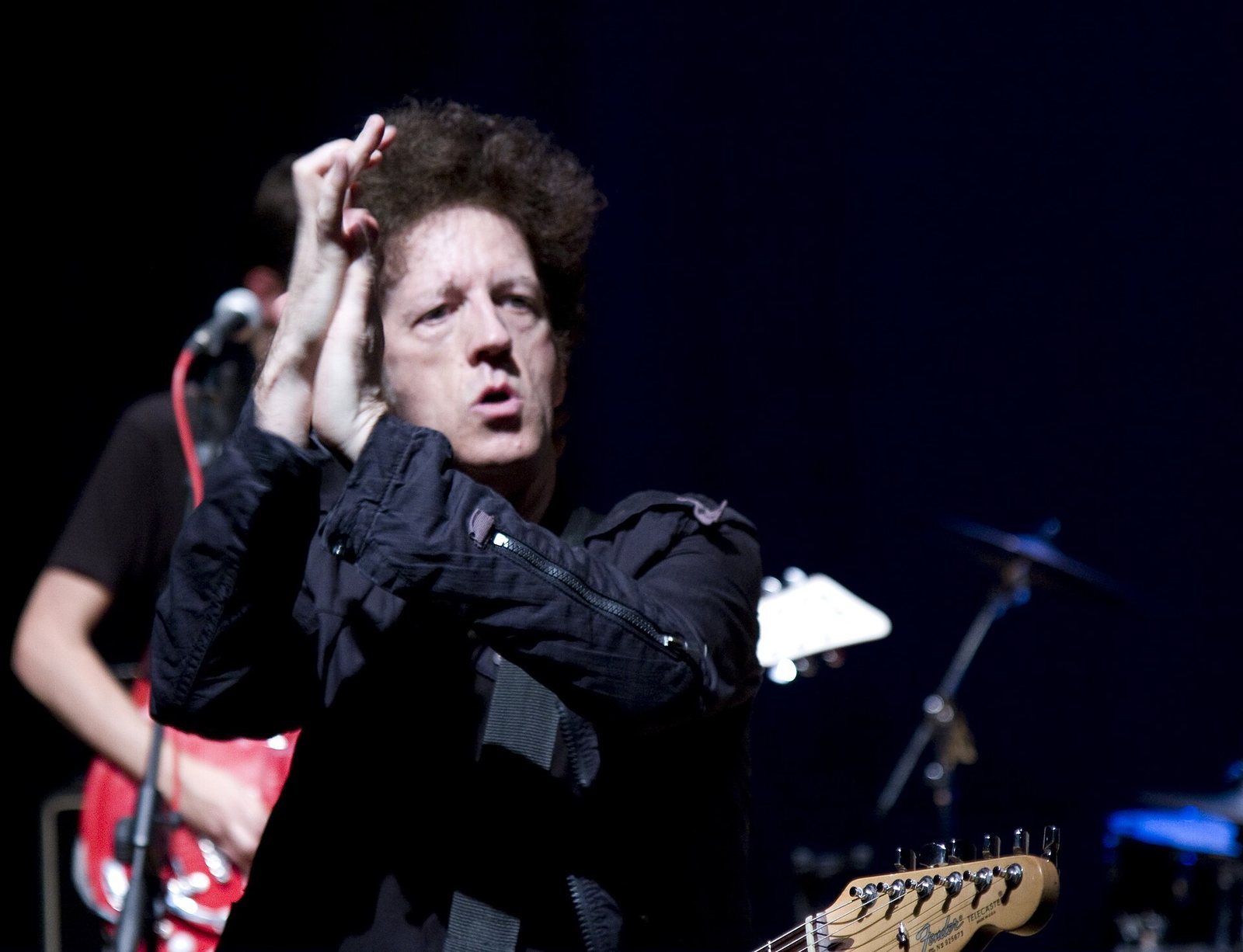 Willie Nile performing on stage with his band in 2010