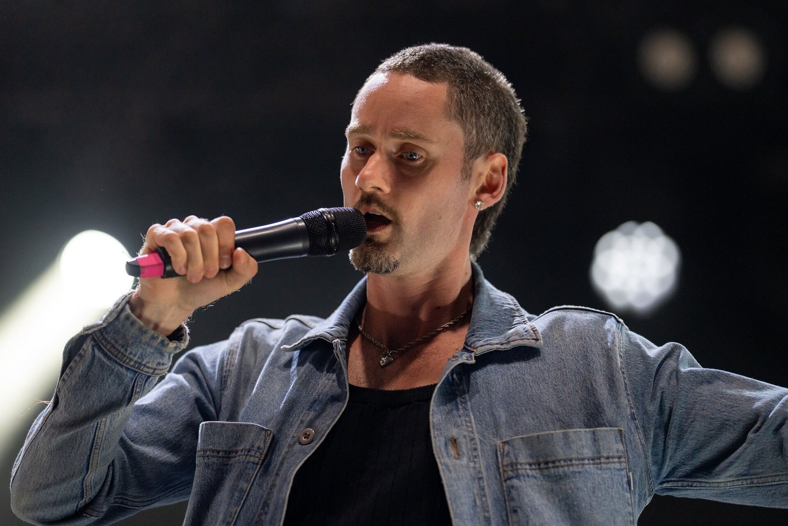 Wu Lyf's singer performing at La Route du Rock festival, Saint-Malo, 2025