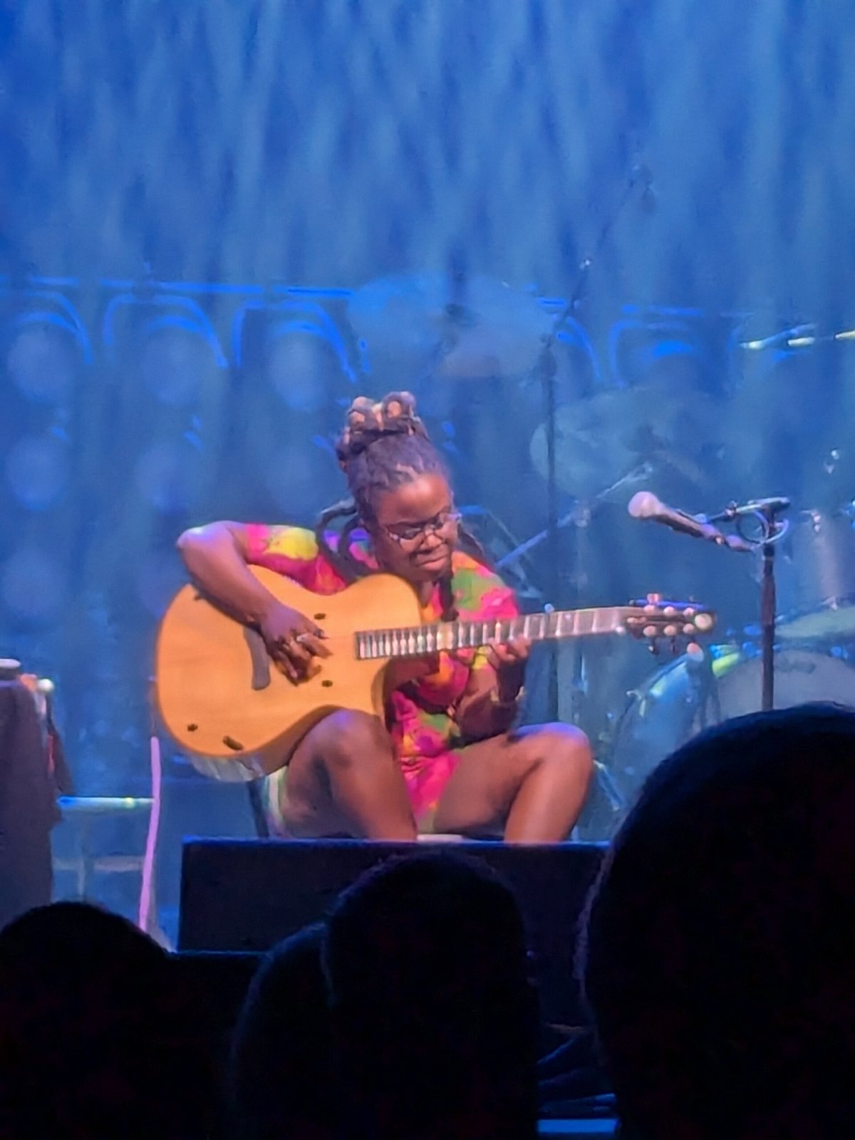 Yasmin Williams playing acoustic guitar on stage at the Roadrunner, Boston, 2024