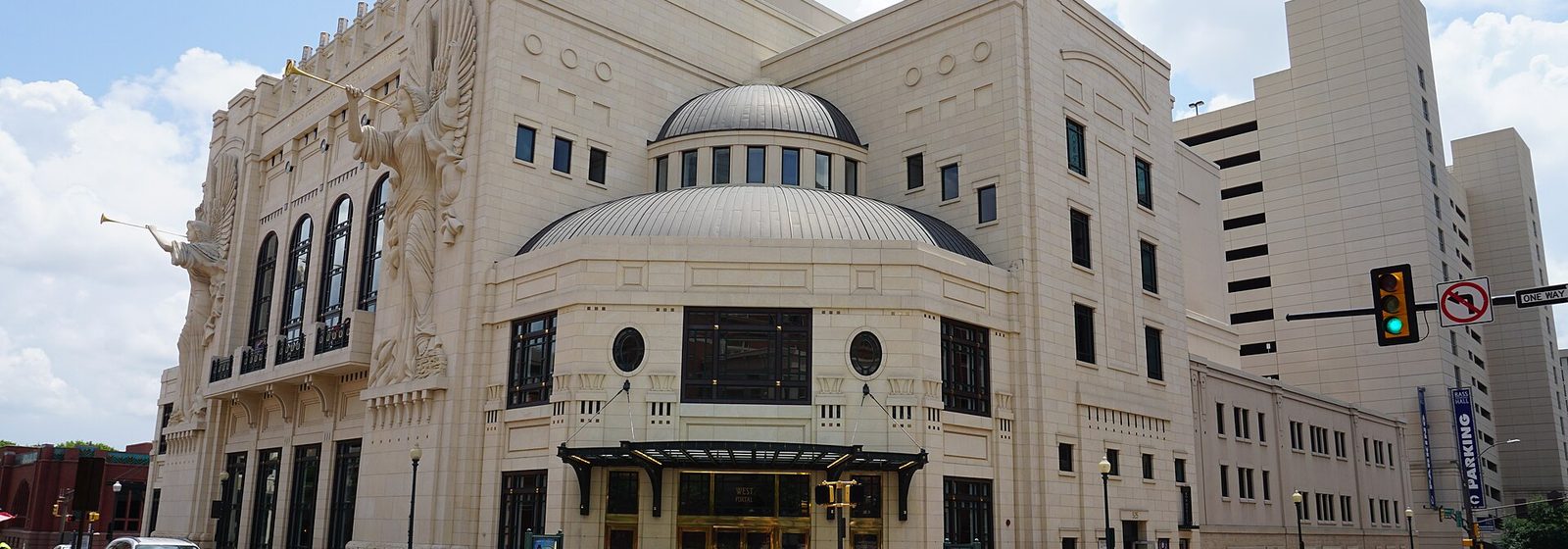 Exterior corner view of the Nancy Lee and Perry R. Bass Performance Hall, showing its limestone facade, angel sculptures, and domed rotunda in downtown Fort Worth, Texas - Bass Performance Hall tickets
