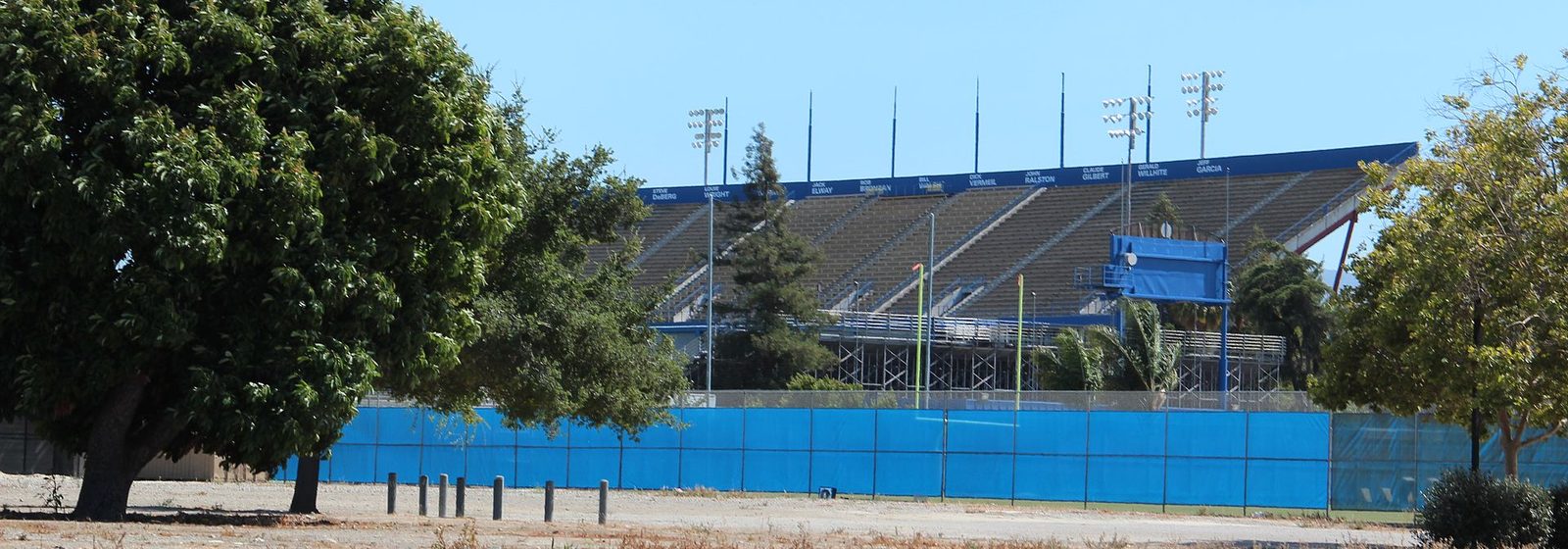 Exterior view of the main grandstand of CEFCU Stadium (Spartan Stadium) at San Jose State University in San Jose, California, seen empty from across an adjacent lot - CEFCU Stadium tickets