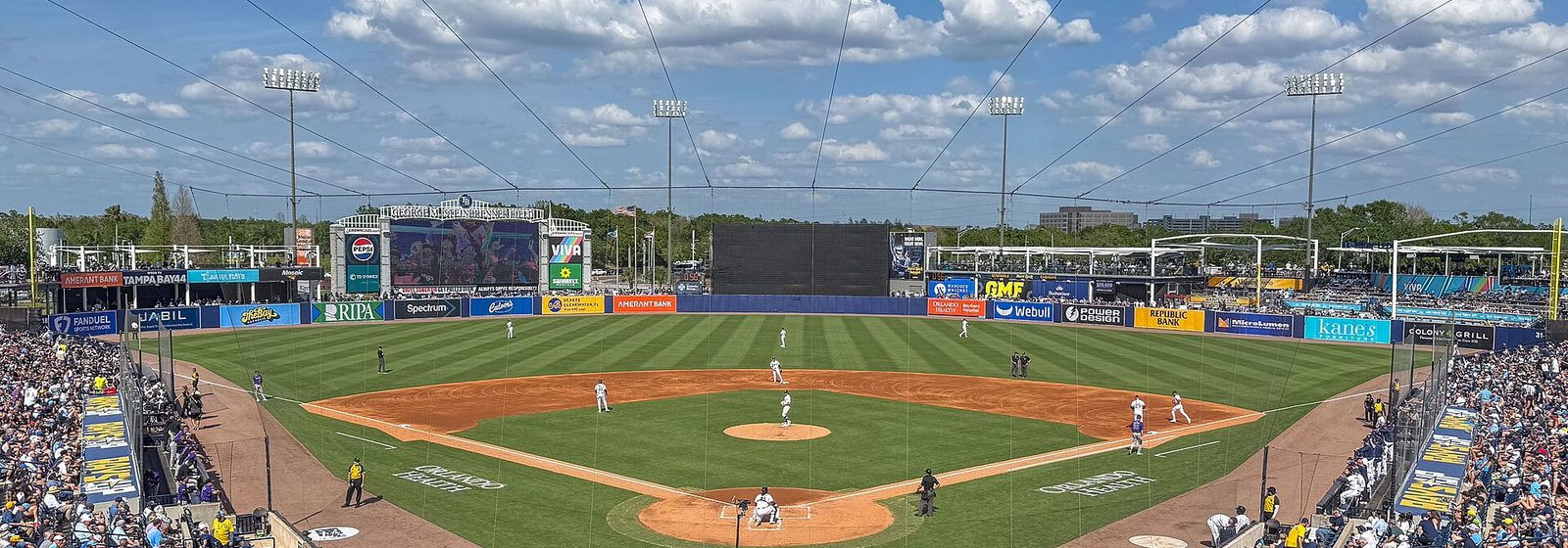 Wide view of the seating bowl and playing field at George M. Steinbrenner Field in Tampa, Florida, during a daytime baseball game - George M. Steinbrenner Field tickets