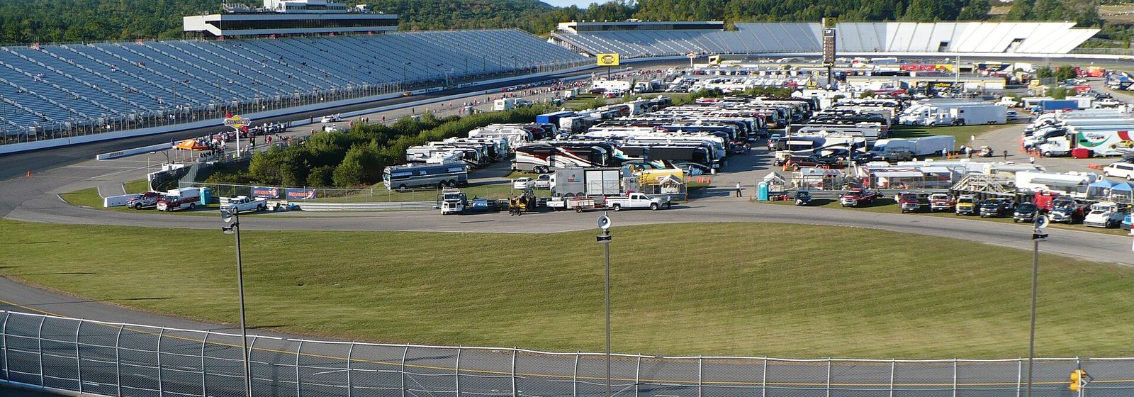 Wide view from the grandstands across the track and infield of New Hampshire Motor Speedway in Loudon, New Hampshire - New Hampshire Motor Speedway tickets