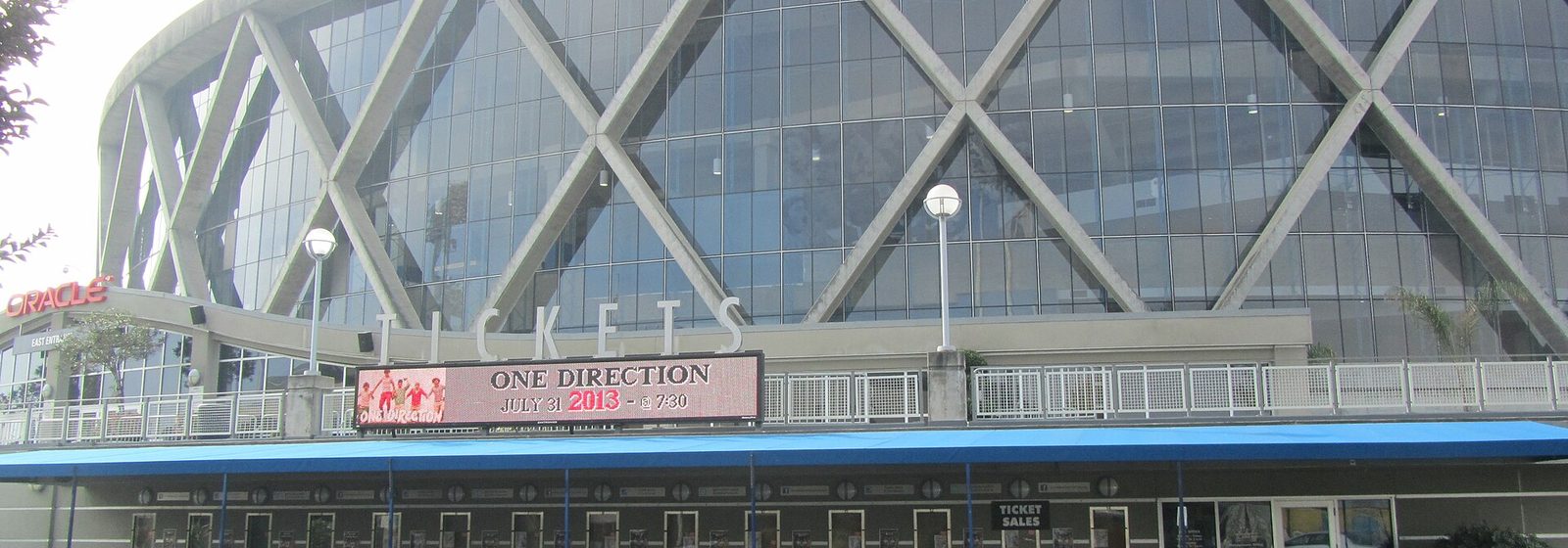 Daytime exterior view of Oakland Arena, then named Oracle Arena, in Oakland, California - Oakland Arena tickets