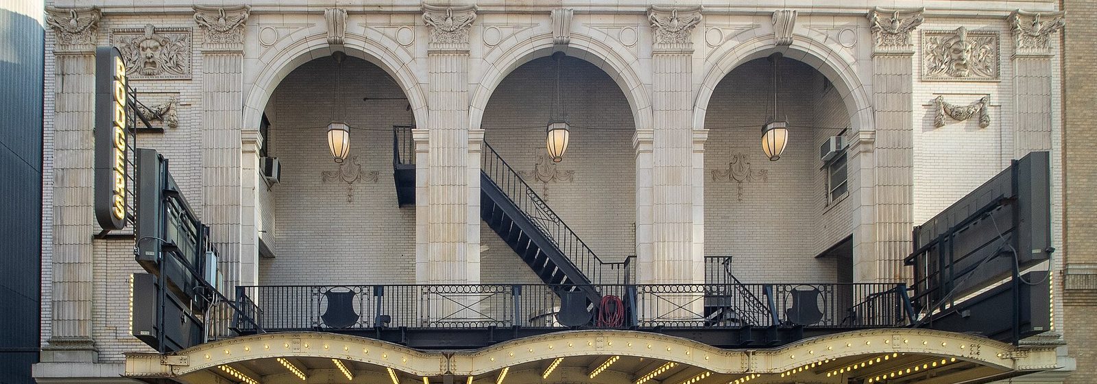 Facade of the Richard Rodgers Theatre on West 46th Street in New York City, with its arched second story, marquee, and vertical Rodgers sign - Richard Rodgers Theatre tickets