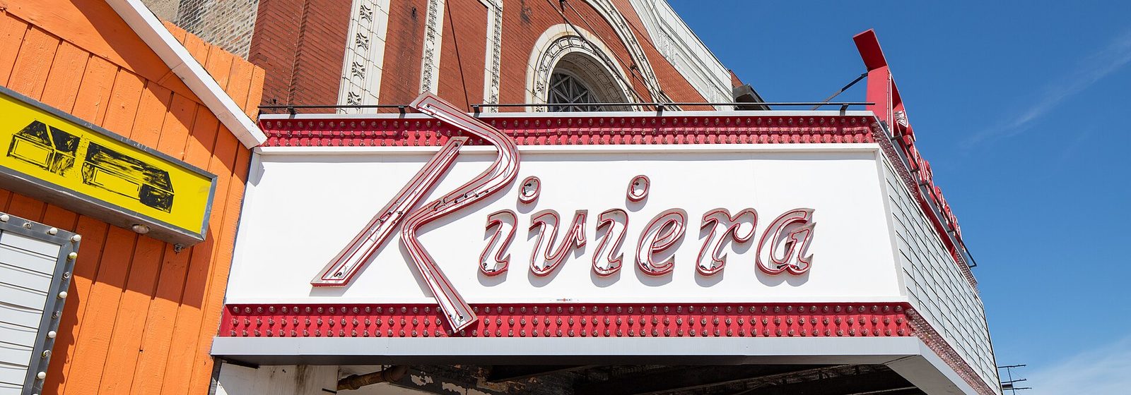 Daytime exterior view of the Riviera Theatre facade and marquee in the Uptown neighborhood of Chicago - Riviera Theatre - IL tickets