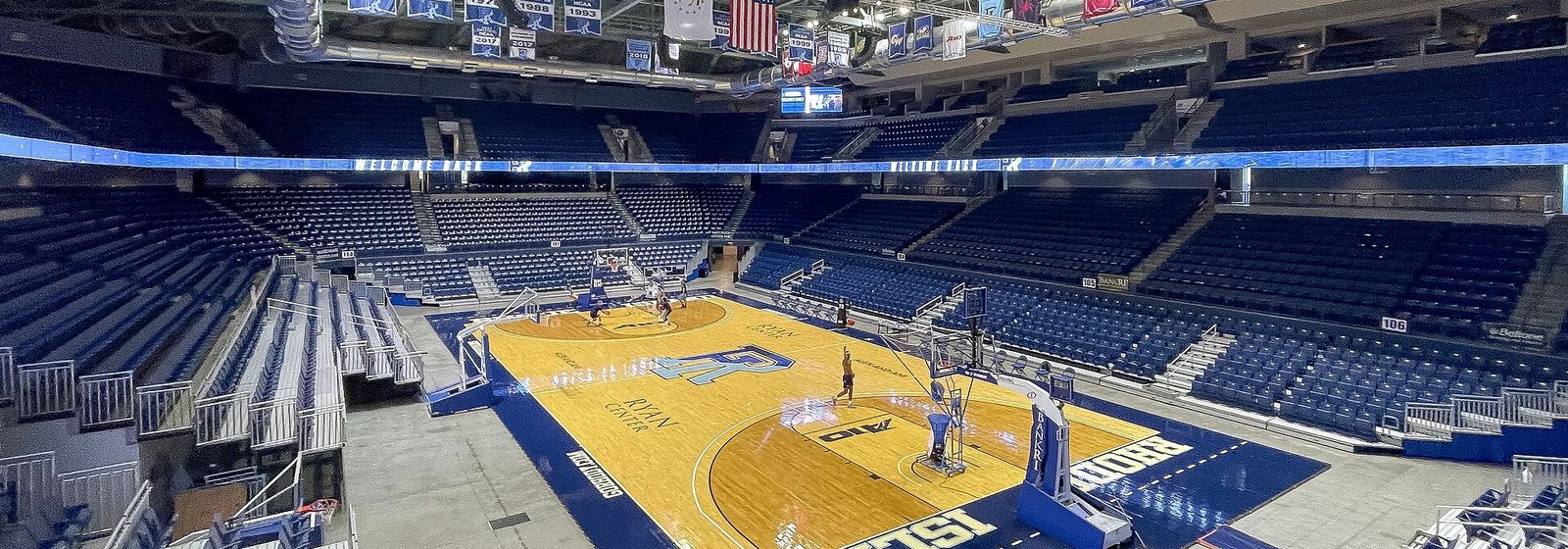 Wide interior view of the seating bowl and basketball court at the Ryan Center arena in Kingston, Rhode Island - Ryan Center tickets