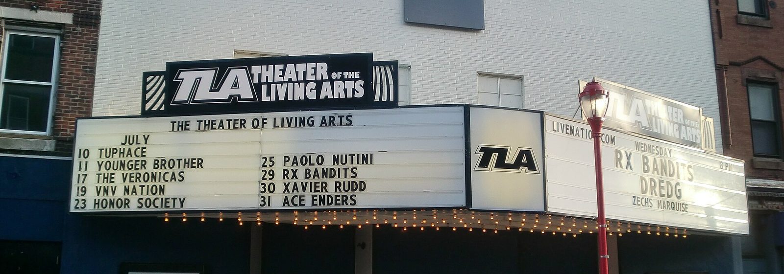 Street-level view of the Theatre of the Living Arts facade and marquee on South Street in Philadelphia - Theatre Of The Living Arts tickets