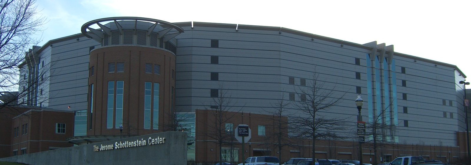 Street-level exterior view of Value City Arena at the Jerome Schottenstein Center in Columbus, Ohio, with the venue's entrance sign in the foreground - Value City Arena at The Schottenstein Center tickets