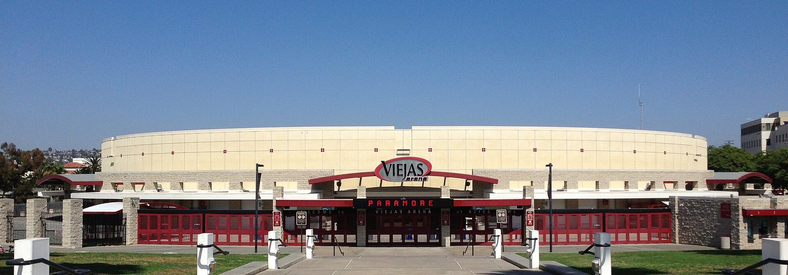 Front exterior of Viejas Arena on the San Diego State University campus in San Diego, seen from the entrance plaza under a clear sky - Viejas Arena At Aztec Bowl tickets
