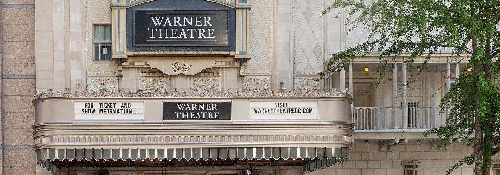 Street-level view of the Warner Theatre facade and marquee on 13th Street NW in Washington, D.C - Warner Theatre - DC tickets